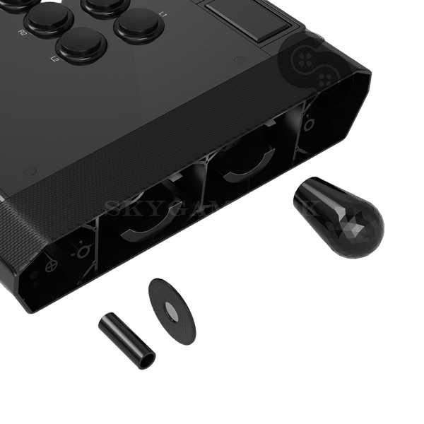 Qanba Obsidian 2 Arcade Joystick PS5/PS4 - side storage compartment open with the spare ball top and bat top